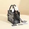 The Paris map small book tote handbag was designed by Maria Grazia Chiuri