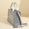 a1720369072657_4457 This book tote handbag was designed by Maria Grazia Chiuri, Creative Director of Dior Women's Wear
