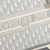 a1720369073380_1611 This book tote handbag was designed by Maria Grazia Chiuri, Creative Director of Dior Women's Wear