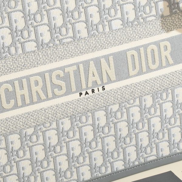 a1720369073380_1611 This book tote handbag was designed by Maria Grazia Chiuri, Creative Director of Dior Women's Wear