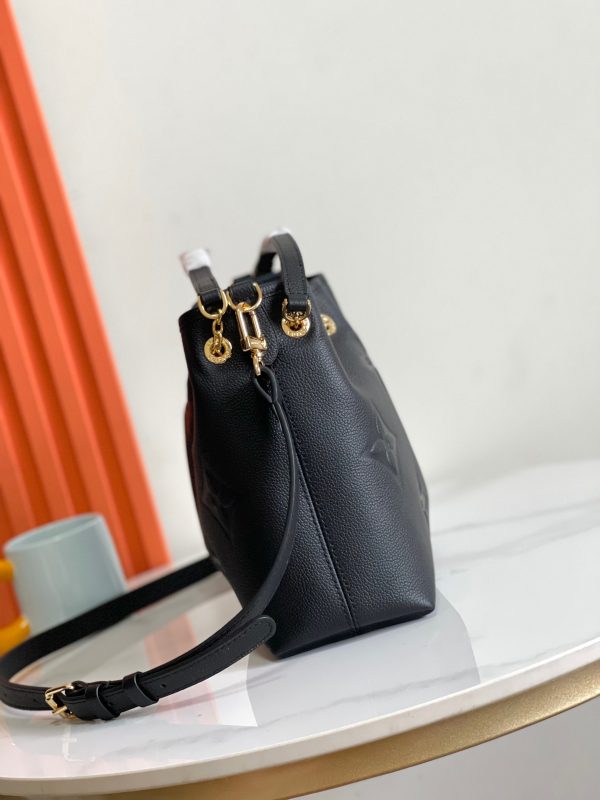 a1722672386987_8322 LV Bundle handbag is Monogram Empreinte