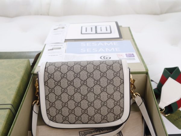i1623397475_105_4 The GG horseclip 1955 series mini handbag adds a mix and match style to this retro style collection