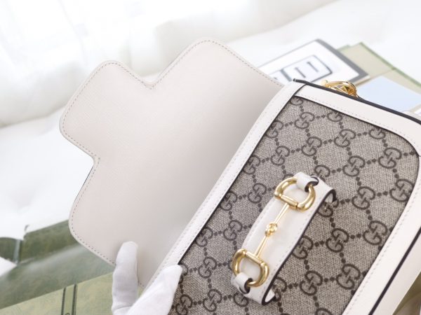 i1623397475_1130_8 The GG horseclip 1955 series mini handbag adds a mix and match style to this retro style collection