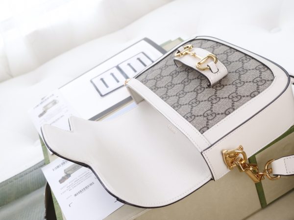 i1623397475_303_2 The GG horseclip 1955 series mini handbag adds a mix and match style to this retro style collection