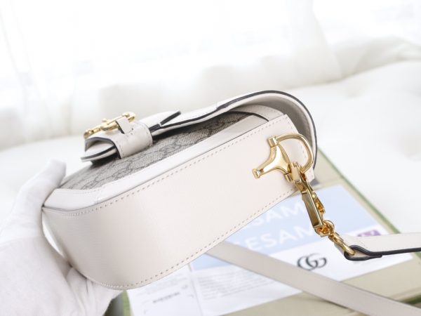 i1623397475_4529_7 The GG horseclip 1955 series mini handbag adds a mix and match style to this retro style collection
