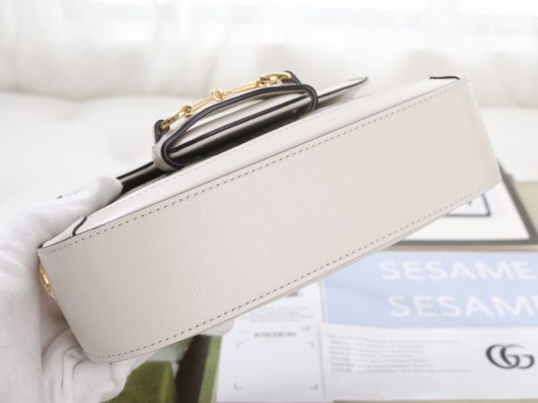i1623397475_8452_5 The GG horseclip 1955 series mini handbag adds a mix and match style to this retro style collection