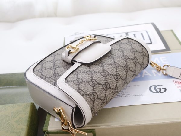 i1623397475_8515_3 The GG horseclip 1955 series mini handbag adds a mix and match style to this retro style collection