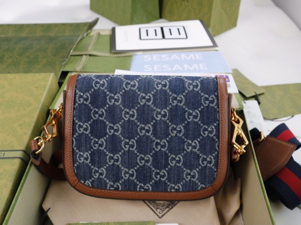 i1625728386_5792_3 The GG horseclip 1955 series mini handbag adds a mix and match style to this retro style collection