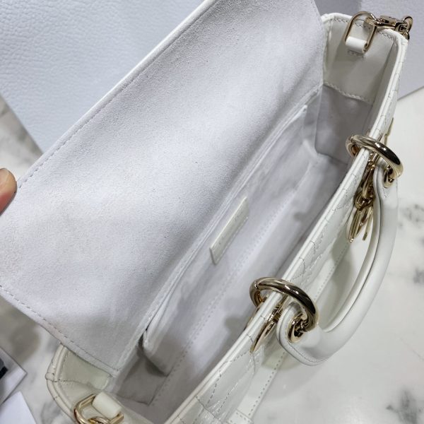This Lady D-Joy handbag embodies Dr.'s profound insight into elegance and beauty