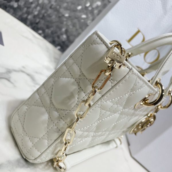 This Lady D-Joy handbag embodies Dr.'s profound insight into elegance and beauty