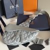 i1653627316_5572_0 This saddle bag reinterprets the classic style with Dior grey canvas, adorned with CD Diamond pattern, inspired by Dior archives
