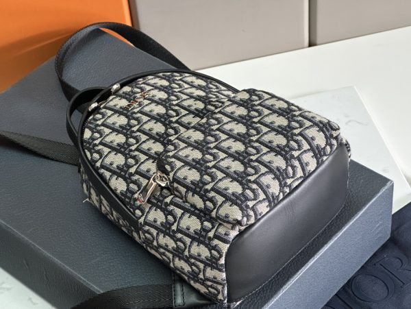 i1694951180_1534_6 🎆 This Rider backpack is carefully crafted with beige and blue Oblique printed fabrics
