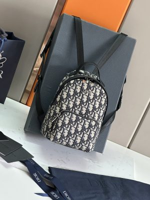 i1694951180_6887_0 🎆 This Rider backpack is carefully crafted with beige and blue Oblique printed fabrics
