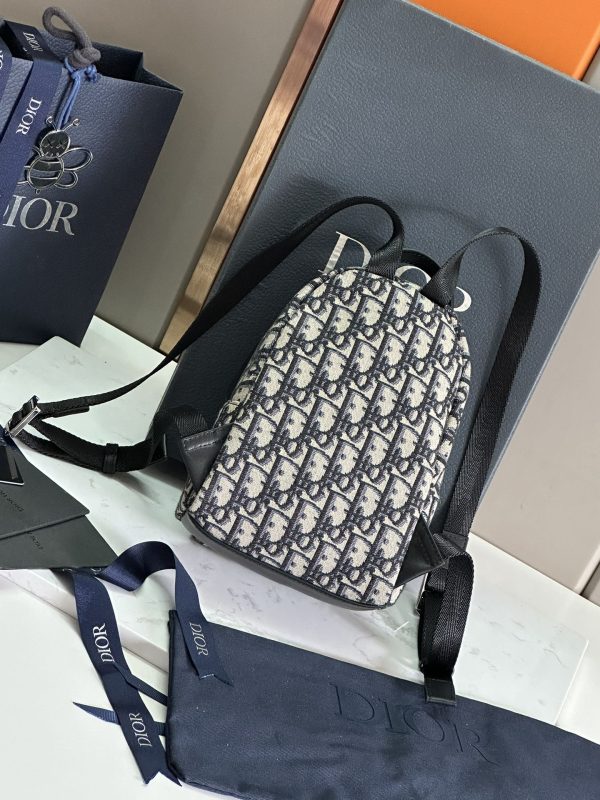 i1694951180_9650_4 🎆 This Rider backpack is carefully crafted with beige and blue Oblique printed fabrics