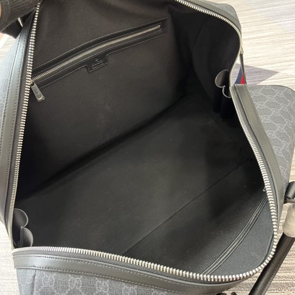 i1719418622_7573_0 New GG travel bag. Classic GG Supreme canvas is known for its soft and stretchy texture