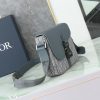 This small saddle messenger bag features a flip design, exquisite and stylish. Crafted with deep grey Oblique printed fabric