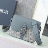 This small saddle messenger bag features a flip design, exquisite and stylish. Crafted with deep grey Oblique printed fabric