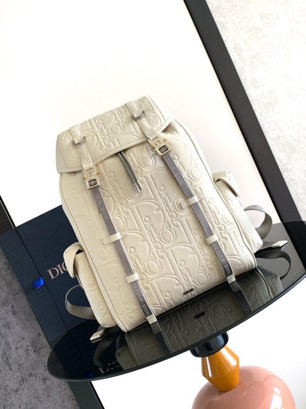 i1725289307_5867_4 This Dior Hit The Road flip backpack blends modern style with Dior's haute couture spirit