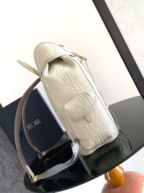 i1725289307_5930_6 This Dior Hit The Road flip backpack blends modern style with Dior's haute couture spirit
