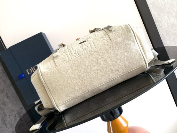 i1725289307_6623_3 This Dior Hit The Road flip backpack blends modern style with Dior's haute couture spirit