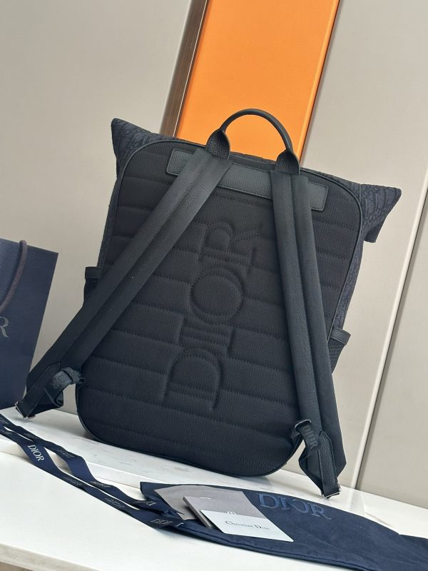 This top of the line original Dior 8-roll top backpack is a new addition to the Spring 2025 men's clothing collection