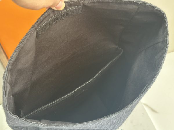 This top of the line original Dior 8-roll top backpack is a new addition to the Spring 2025 men's clothing collection