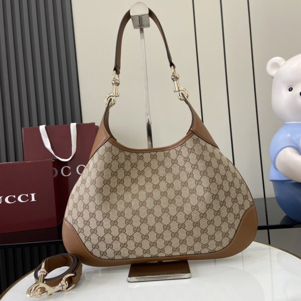 i1741858251_1637_0 Presenting the Gucci Body Double Lock Handbag Collection,