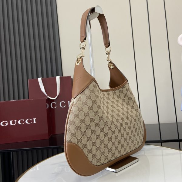 i1741858251_9188_0 Presenting the Gucci Body Double Lock Handbag Collection,