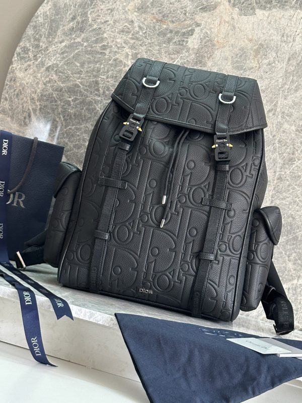 i1746805596318_1665_0_0 This Dior Hit The Road flip backpack blends modern style with Dior's haute couture spirit