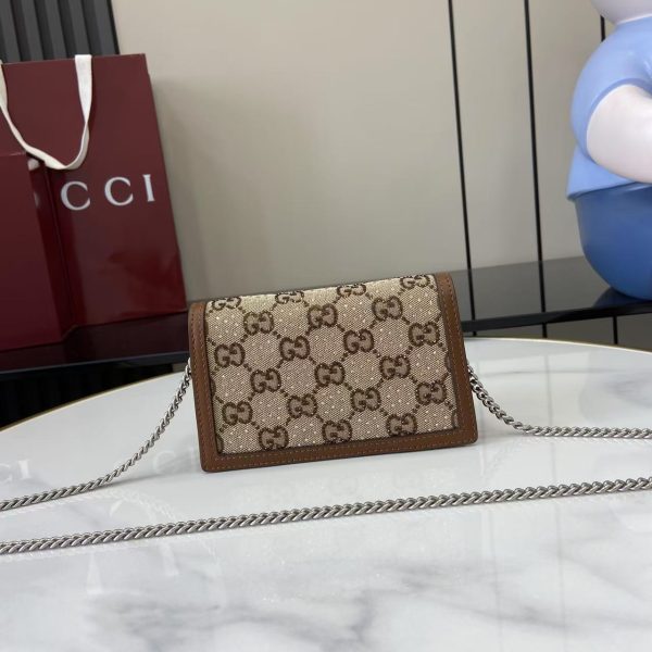 i1755505920063_3974_0_2 This chain mini shoulder backpack has a sleek design and is crafted with GG Supreme canvas