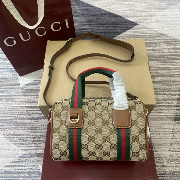 i1758362495373_7006_0_0 The inspiration for the GG mini handbag comes from the styling of Gucci's iconic travel bag