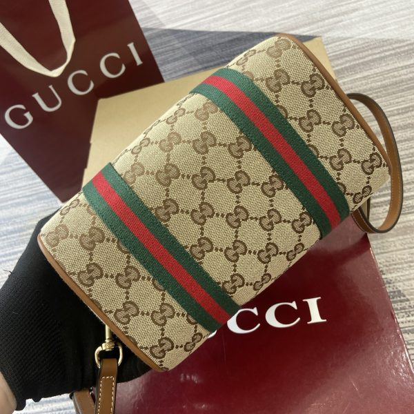 i1758362496986_913_0_8 The inspiration for the GG mini handbag comes from the styling of Gucci's iconic travel bag