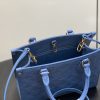 i1774295808572_669_0_7 The OnTheGo small handbag is made of Monogram Empreinte sn leather