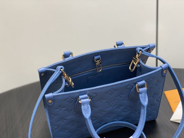 i1774295808572_669_0_7 The OnTheGo small handbag is made of Monogram Empreinte sn leather